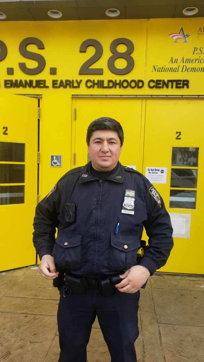 Police Officer Hamidov in front of P.S. 28
