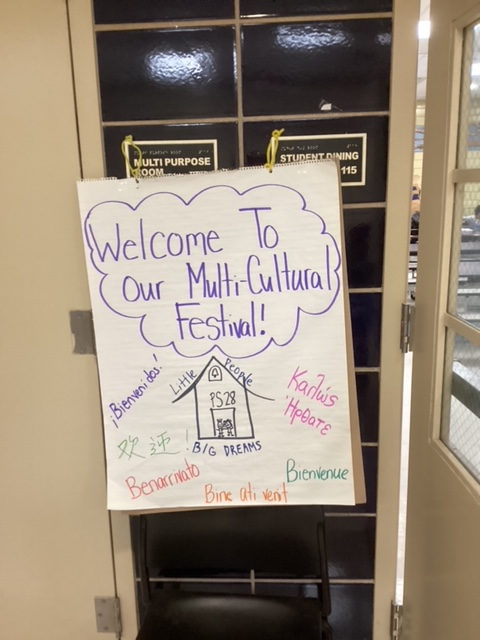 Welcome to Our Multi-Cultural Festival sign on a door