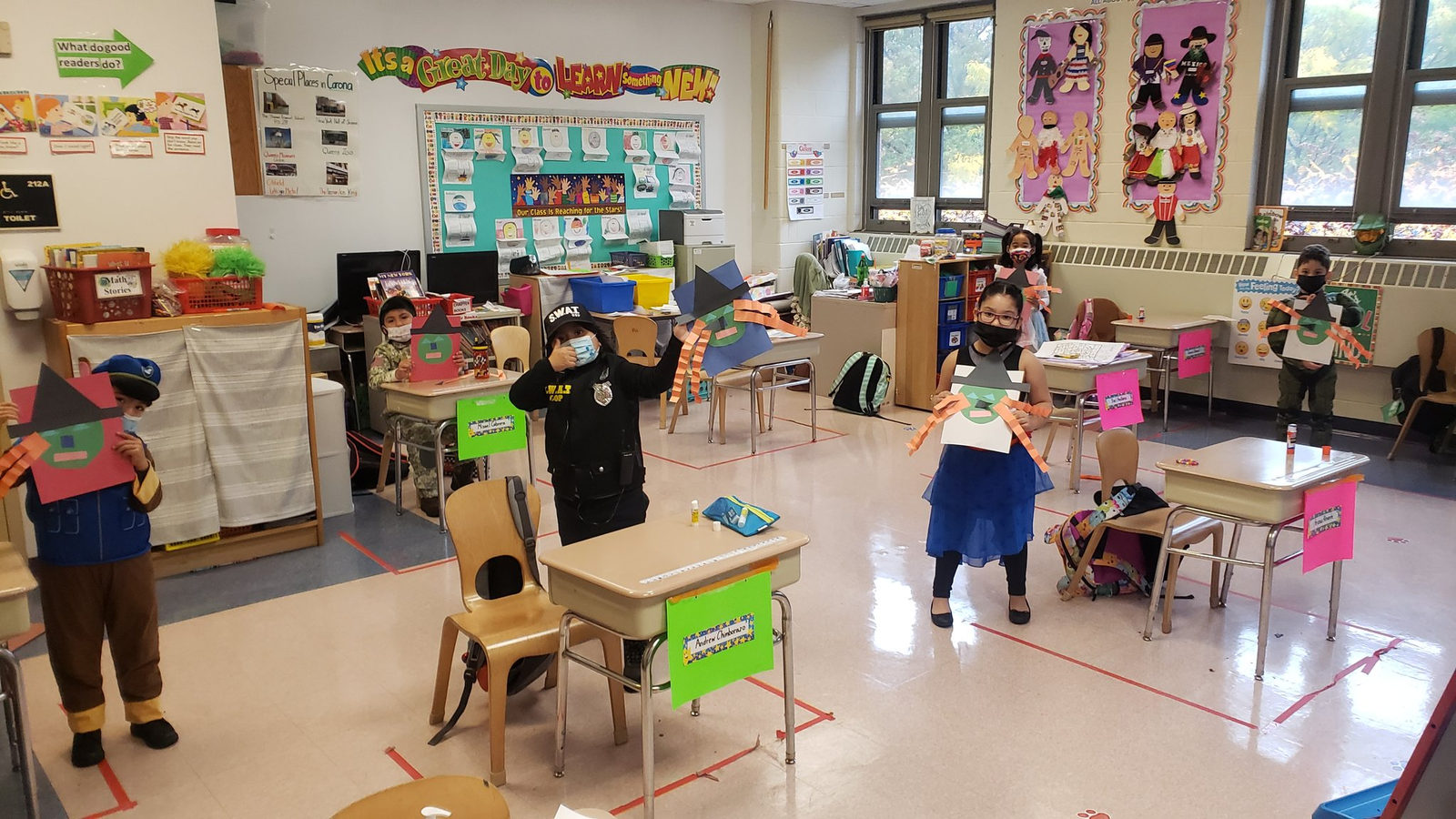 Students in Halloween costumes in their classroom