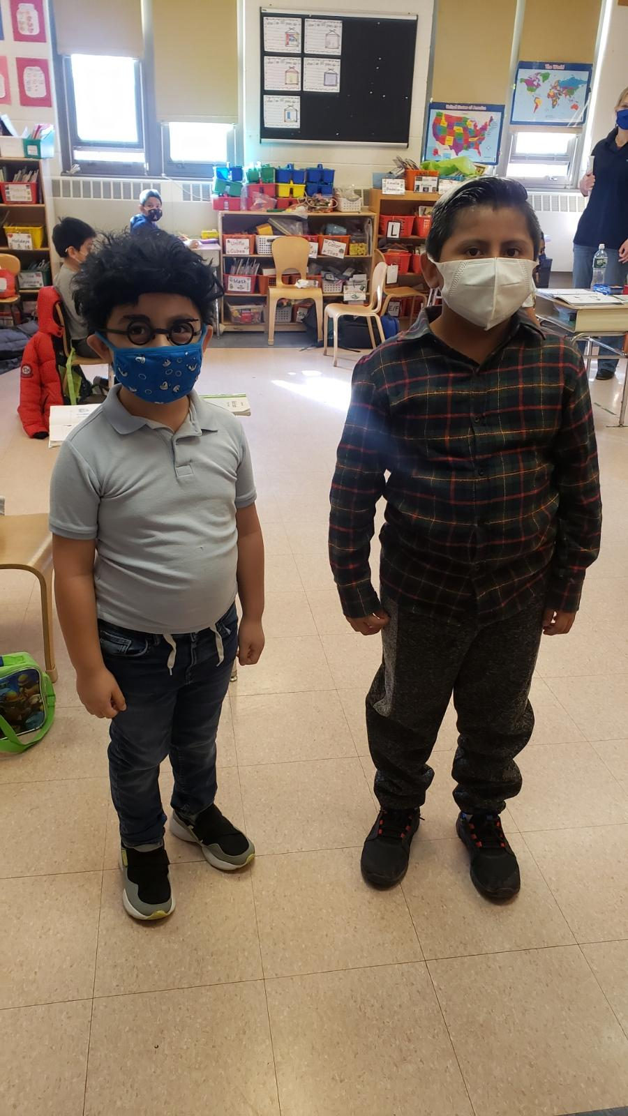 Two students dressed as older men for the 100th day of school