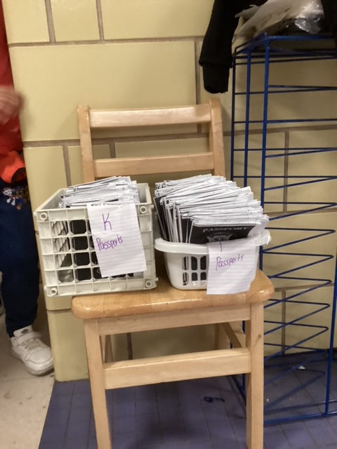 Baskets of class papers set out on a chair