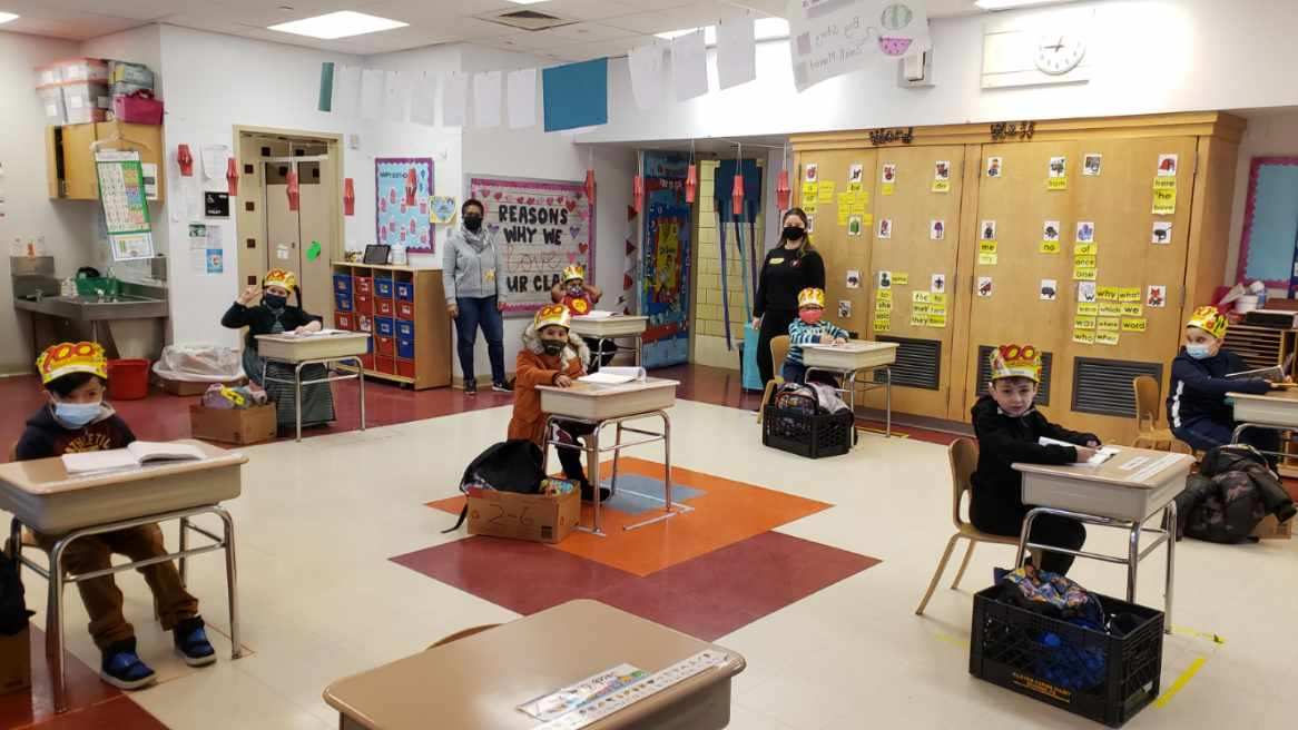 Students at their desks in a classroom