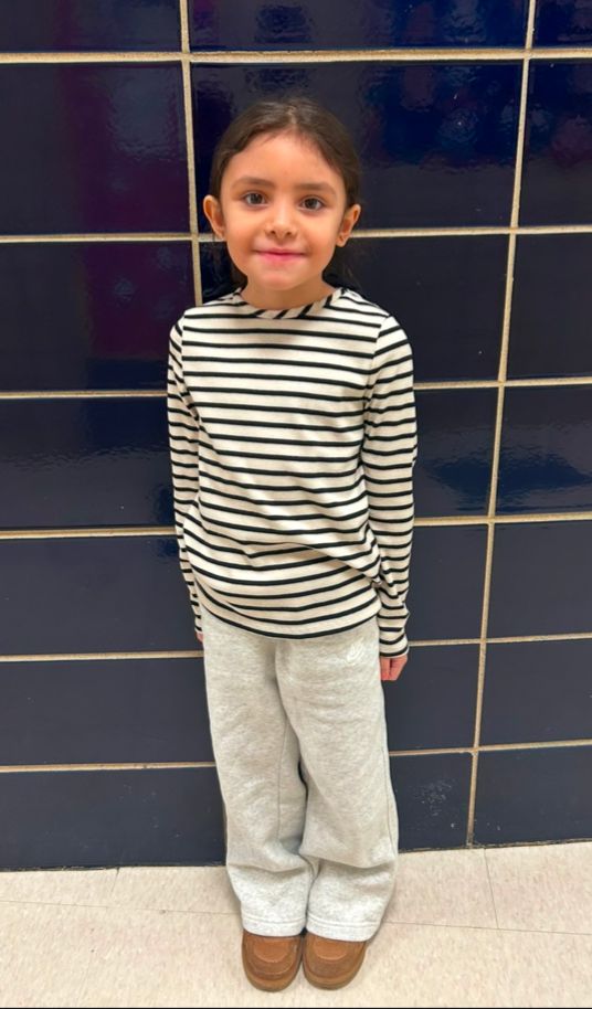 Student ambassador in a striped shirt