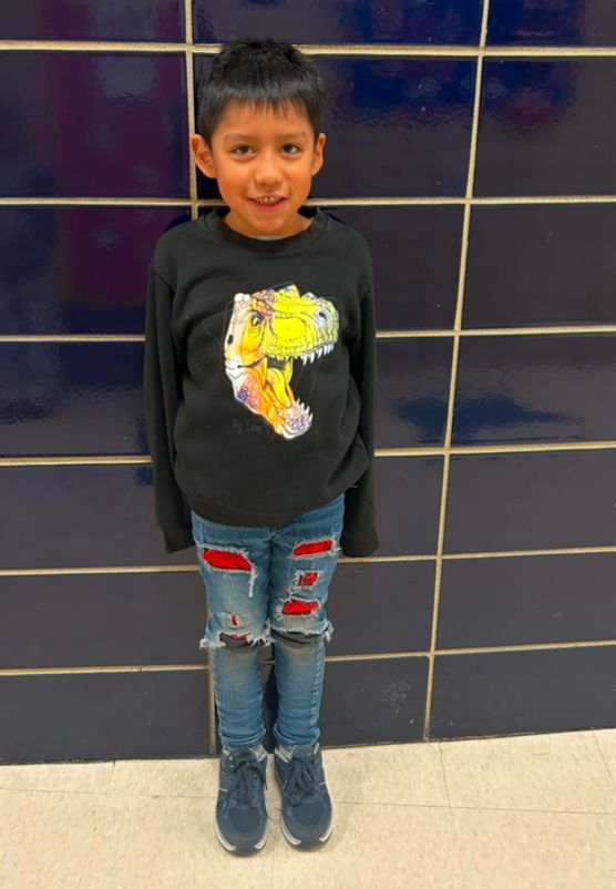 Student ambassador in a black sweatshirt and jeans
