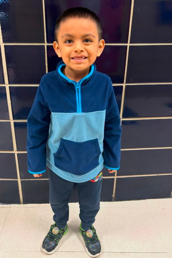 Student ambassador in a blue fleece jacket