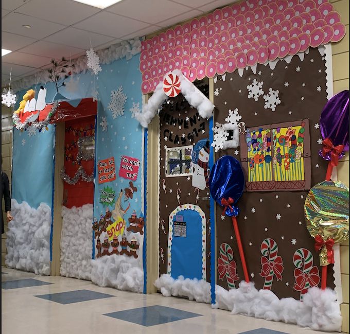 Classroom doors decorated as gingerbread and candy houses